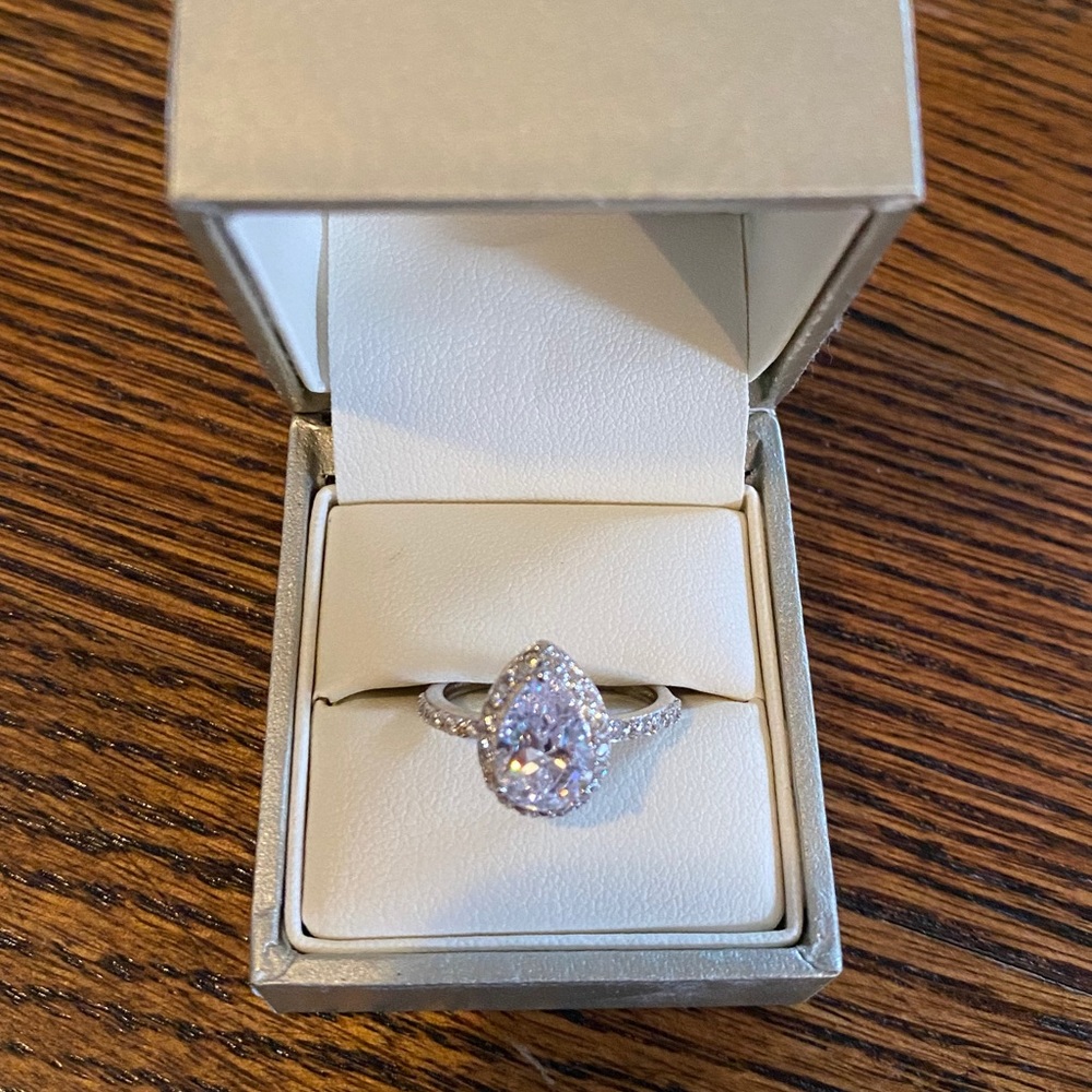 Pear shaped stone with halo costume ring